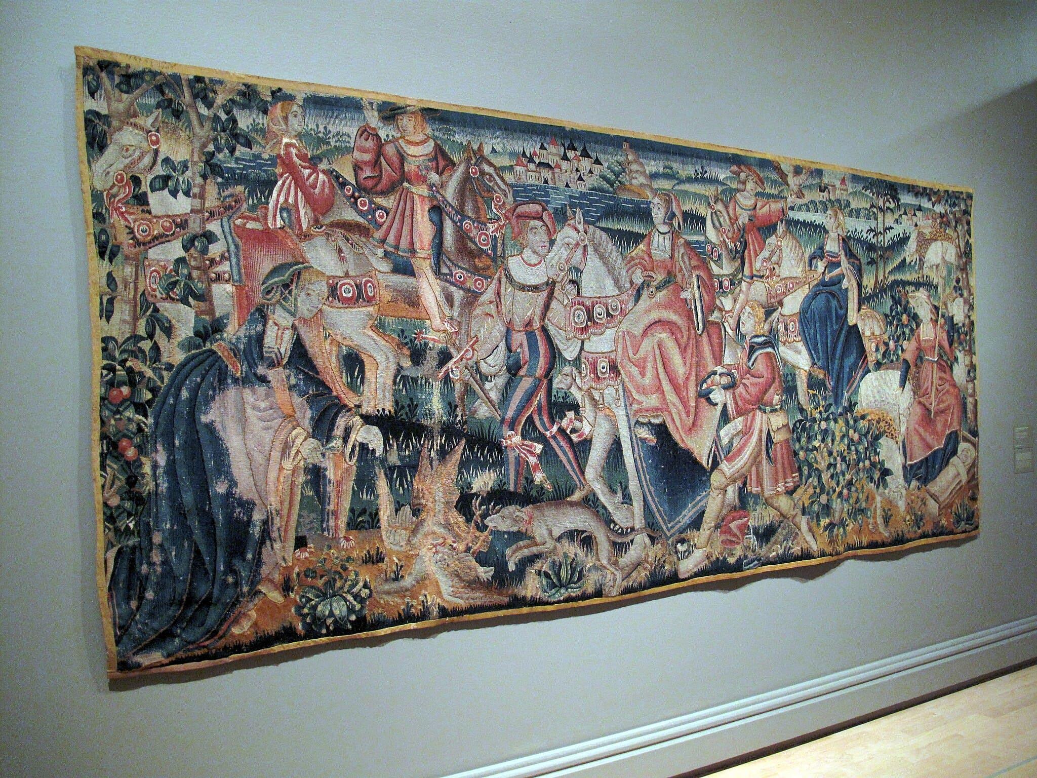 Tapisserie du XVe siècle montrant une chasse à cheval avec nobles et serviteurs